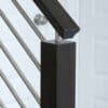 1/2 inch round horizontal bar iron balusters on a stair railing