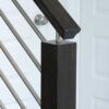 Round bar stem handrail bracket connecting horizontal bars to a wood handrail
