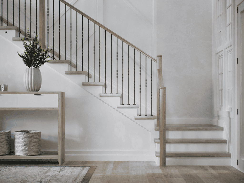Twist Series iron baluster remodel with blank newels and 6084 handrail.