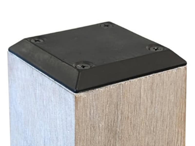 AURO black modern mounting plate screwed to the top of a square wood newel post