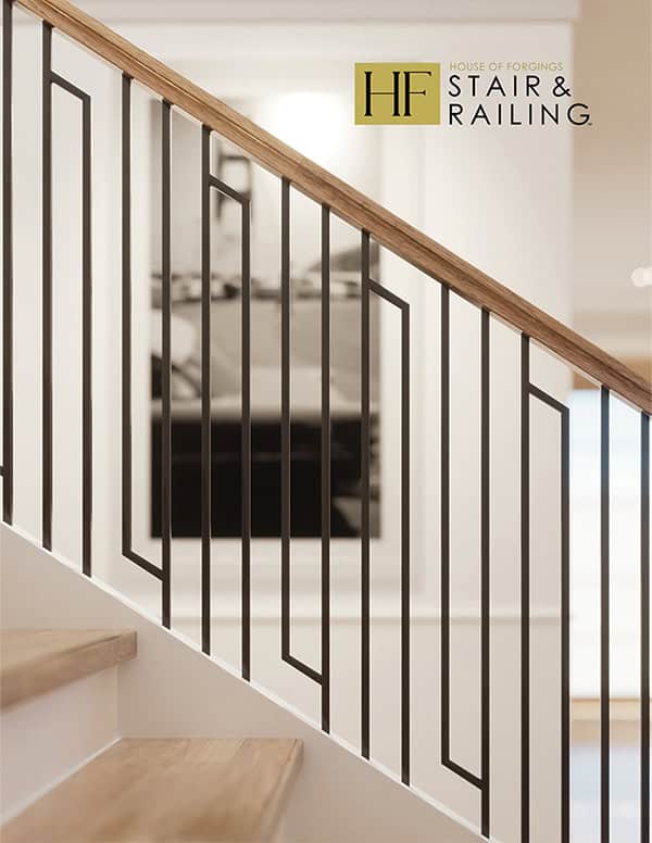 House of Forgings stair and railing catalog cover with black iron balusters and an oak handrail
