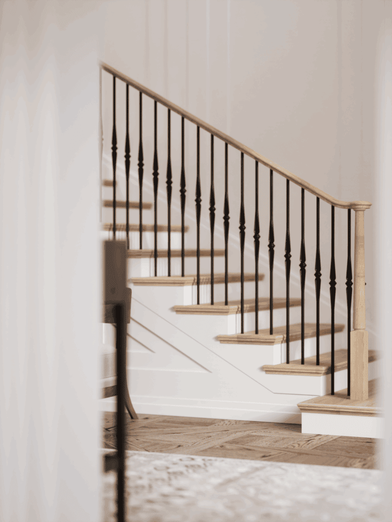 Röhe pin top newel post with a continuous wood handrail