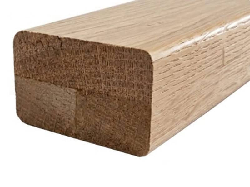 Rectangular modern wood handrail with rounded edges in unfinished oak