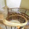 Staircase with 16.1.1 single twist solid iron balusters