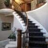 Staircase with 16.1.8 double knuckle Gothic hammered balusters, 44 in tall x 9/16 in square