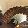 Staircase with 16.1.34-T-IS single knuckle hollow balusters, 44 in tall x 1/2 in square, Economy collection