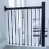 Black handrail mounted to the wall with a 7033 rectangular rosette