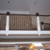 Staircase with 16.1.4 double basket solid iron balusters