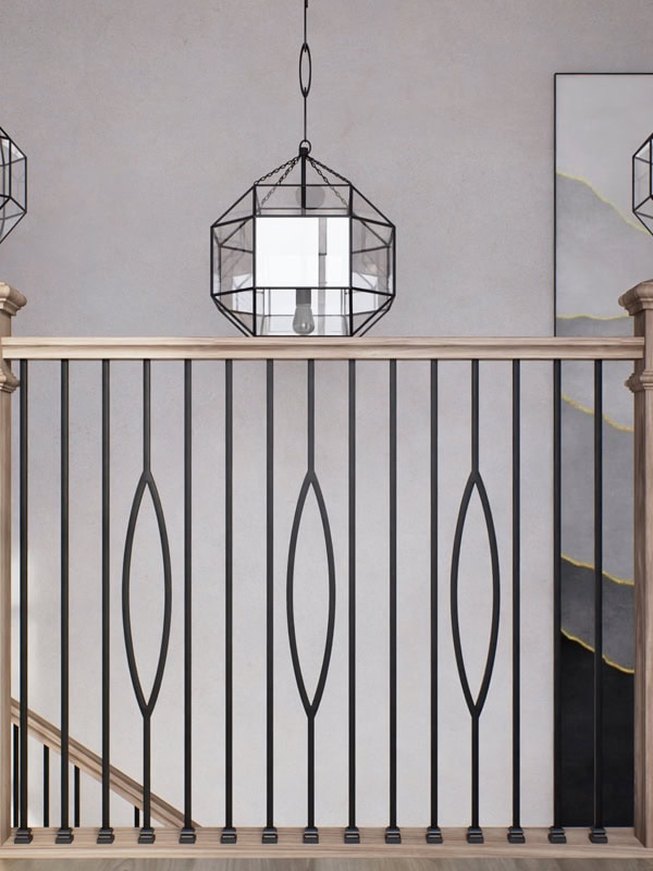 Black iron balusters with single ellipse accents and a light oak handrail on a balcony railing
