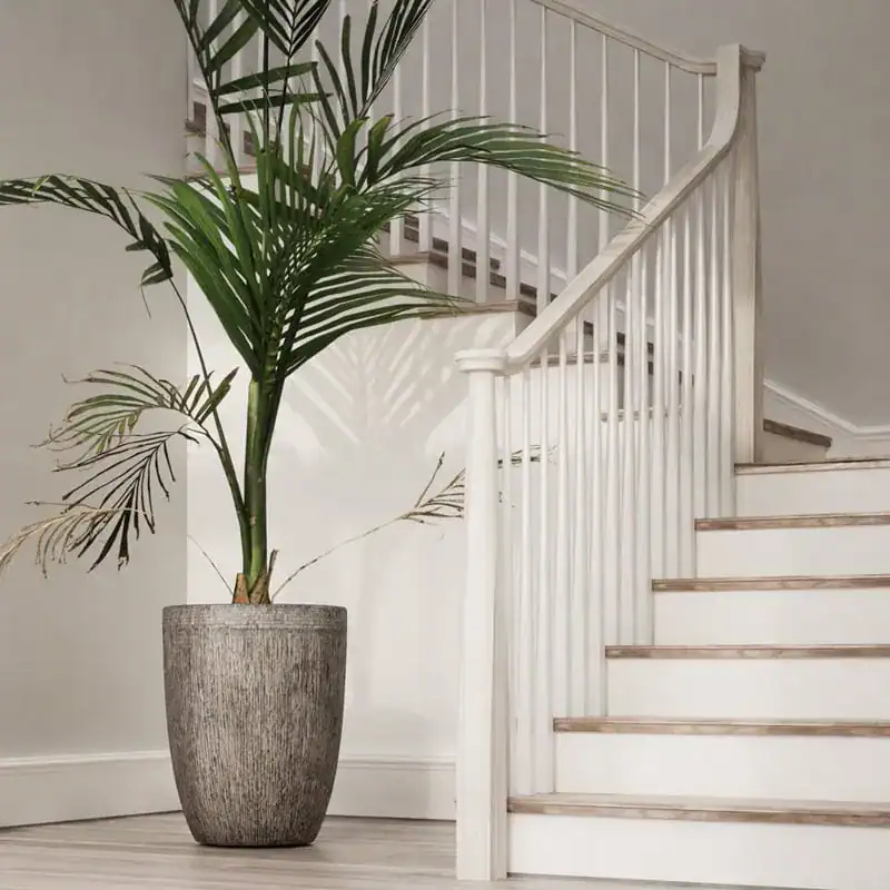 Skandi wood newel post, handrail and balusters on a staircase