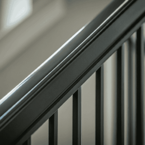How can I improve and maintain the appearance of my wrought iron railings and balusters?