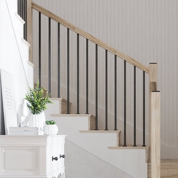 Versatile Modern solid square iron balusters on a white staircase with oak treads