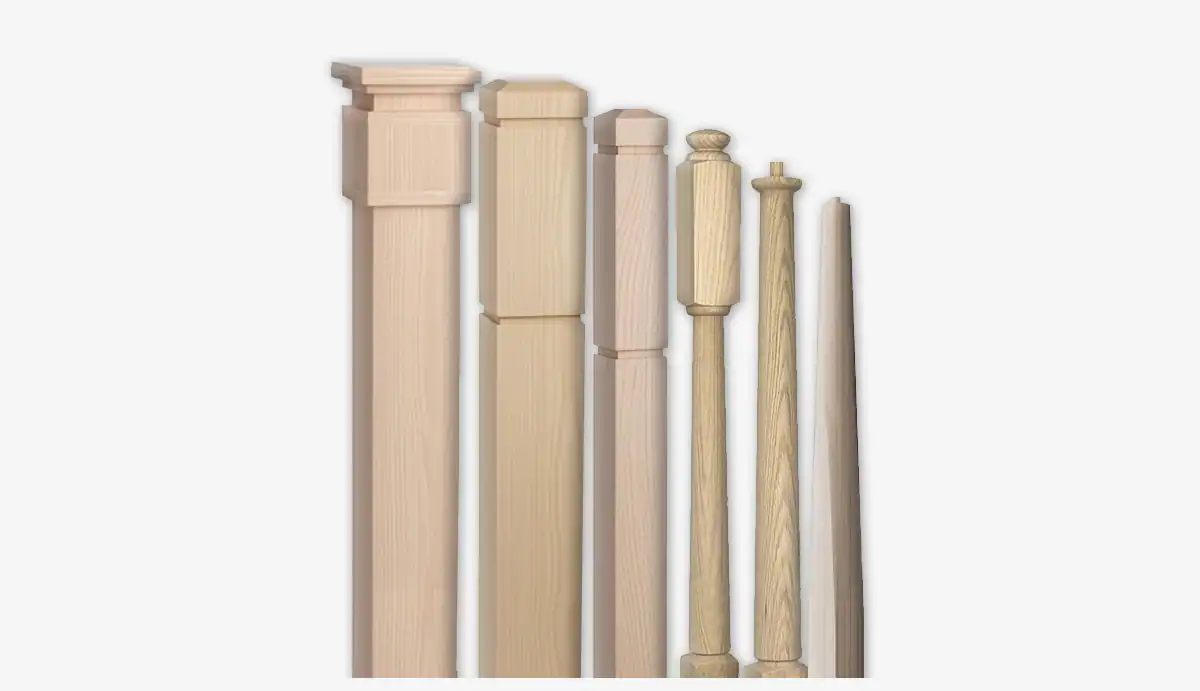Lineup of six unfinished wood newel posts, from square box newels to turned and tapered round newels